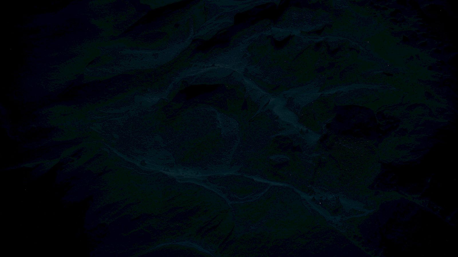 A dark, rippling ocean-like surface with faint specks of light, creating an eerie underwater or stormy seascape feel.